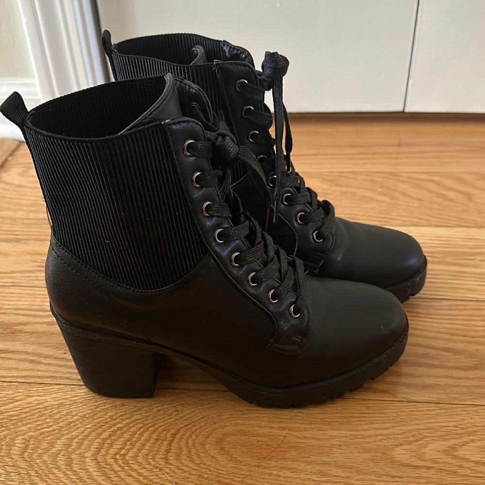 Women’s black leather lace up boots